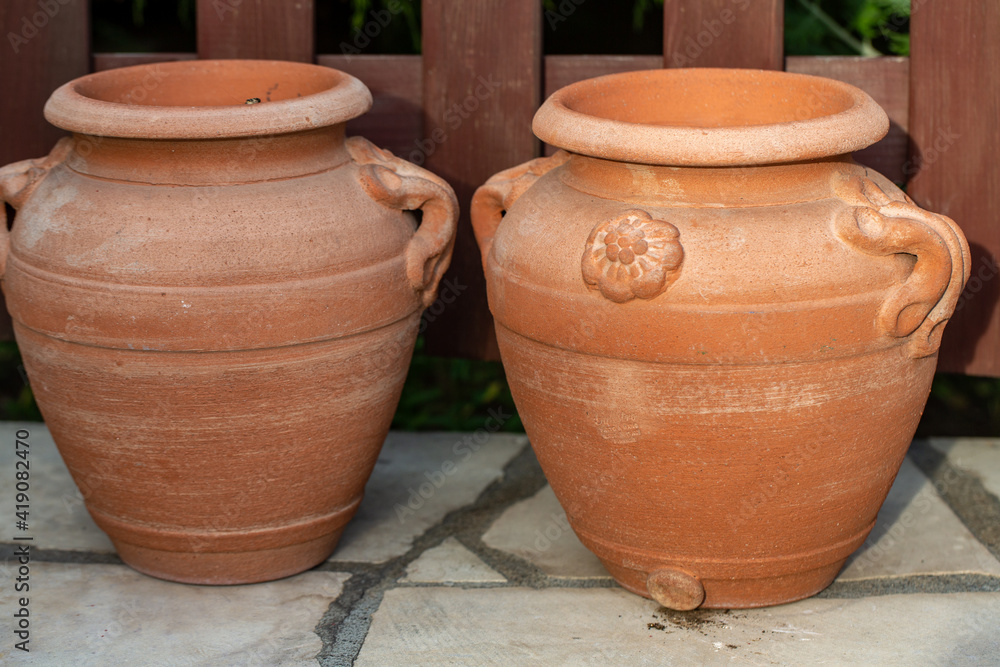 decorative clay pot in garden