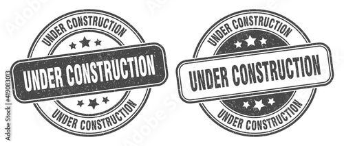 under construction stamp. under construction label. round grunge sign