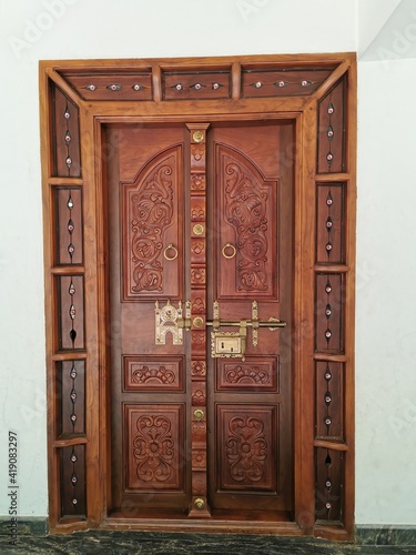 Beautifully crafted  wooden door in kerala, India.