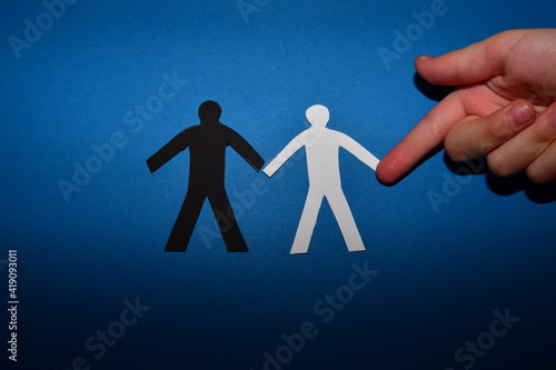 black and white figure  on a blue background