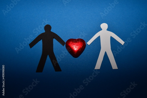 black and white figure and red hearts on a blue background