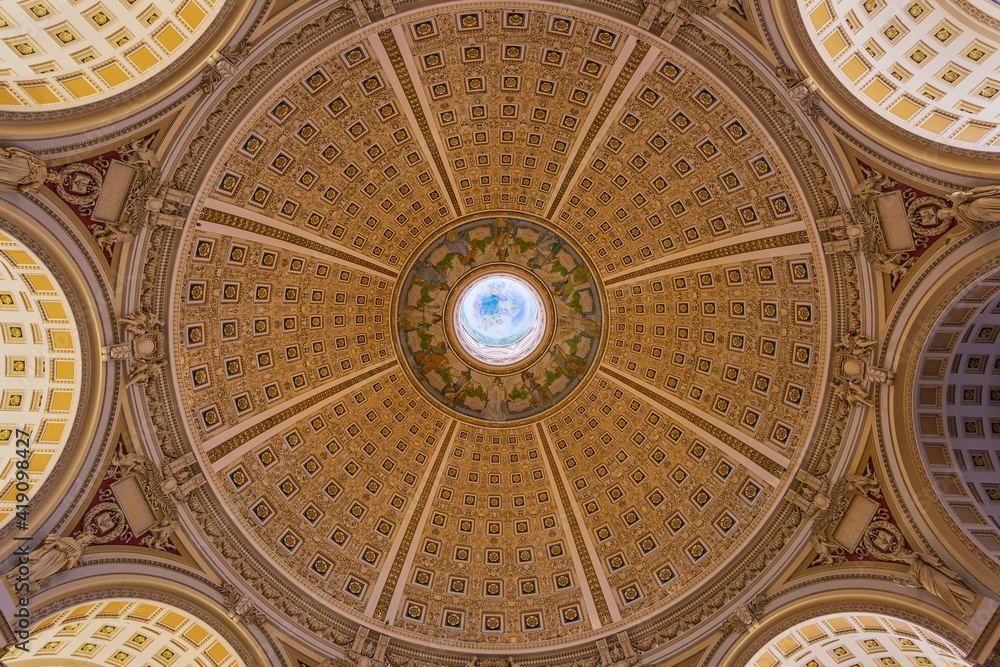 Rotunda ceiling in the reading room on the library of congress in washington dc.