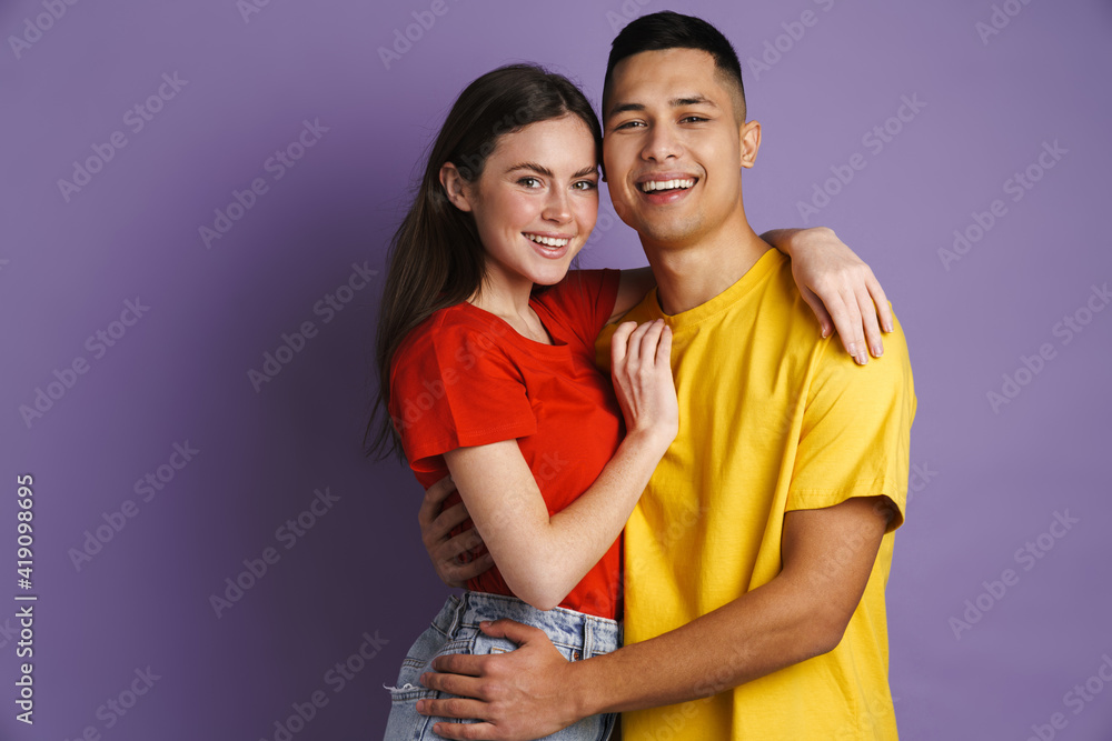 Fototapeta premium Happy handsome guy smiling and looking at camera