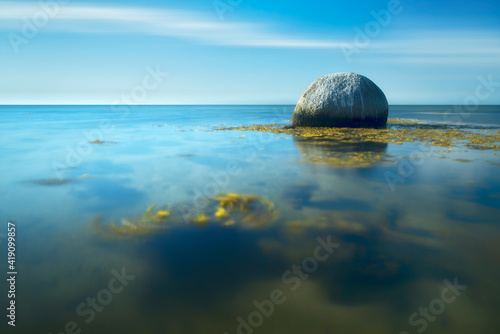 Huge Boulder in the shallow water of the Baltic Sea
