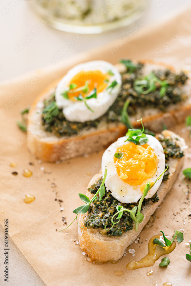 Egg and green pesto sandwiches.