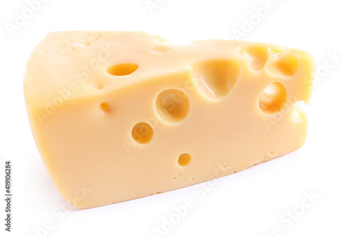 Piece of cheese with holes isolated on white