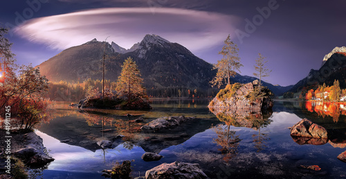 Wonderful Sunny scenery. Splendid mountain landscape. Scenic image of fairy-tale Hintersee lake of summer. Popular travel and hiking destination. Picture of wild area. Awesome Background of nature.