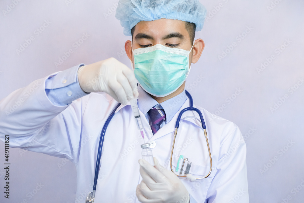 Medicine doctor holding flu, measles, coronavirus vaccine. Vaccination Vaccine Syringe Injection Prevention Immunization Treatment Coronavirus Covid 19 Infectious. Medicine doctor holding flu, measles, coronavirus vaccine. Vaccination Vaccine Syringe Injection Prevention Immunization Treatment Coronavirus Covid 19 Infectious.