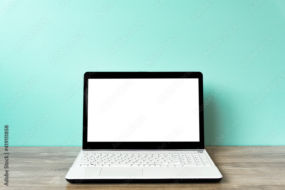 Laptop computer and blank screen in one of a desk.  デスクのノートパソコンとブランクの画面