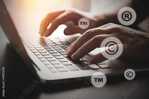 Fotografie Concept of copyrighted material with laptop