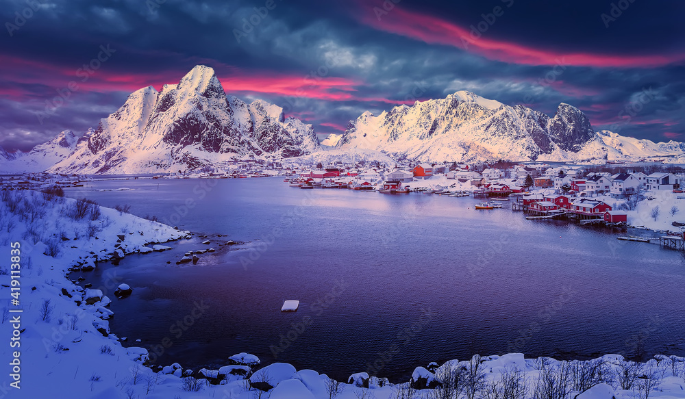 Majestic sunset of the Reinefjord landscape. Famous fishing harbor in the beautiful village of Reine in the Lofoten Islands, Norway. Amazing nature scenery. wonderful picturesque scene.