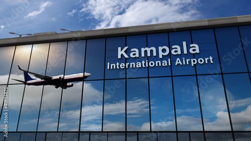 Airplane landing at Kampala Uganda airport mirrored in terminal