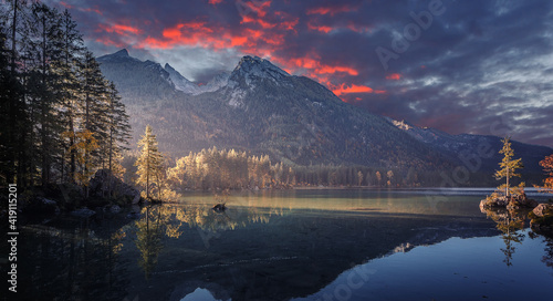 Majestic sunset of the mountains landscape. Wonderful Nature landscape during sunset. Beautiful colored trees over the Hintersee lake  glowing in sunlight. wonderful picturesque scene. color in nature