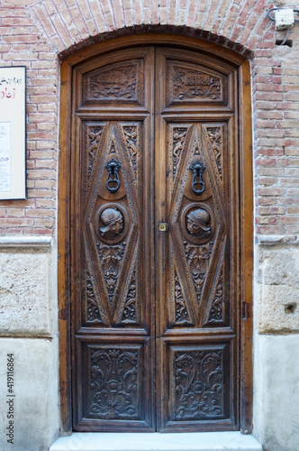 Old wooden door with ornament