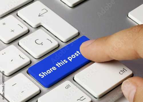 Share this post - Inscription on Blue Keyboard Key.