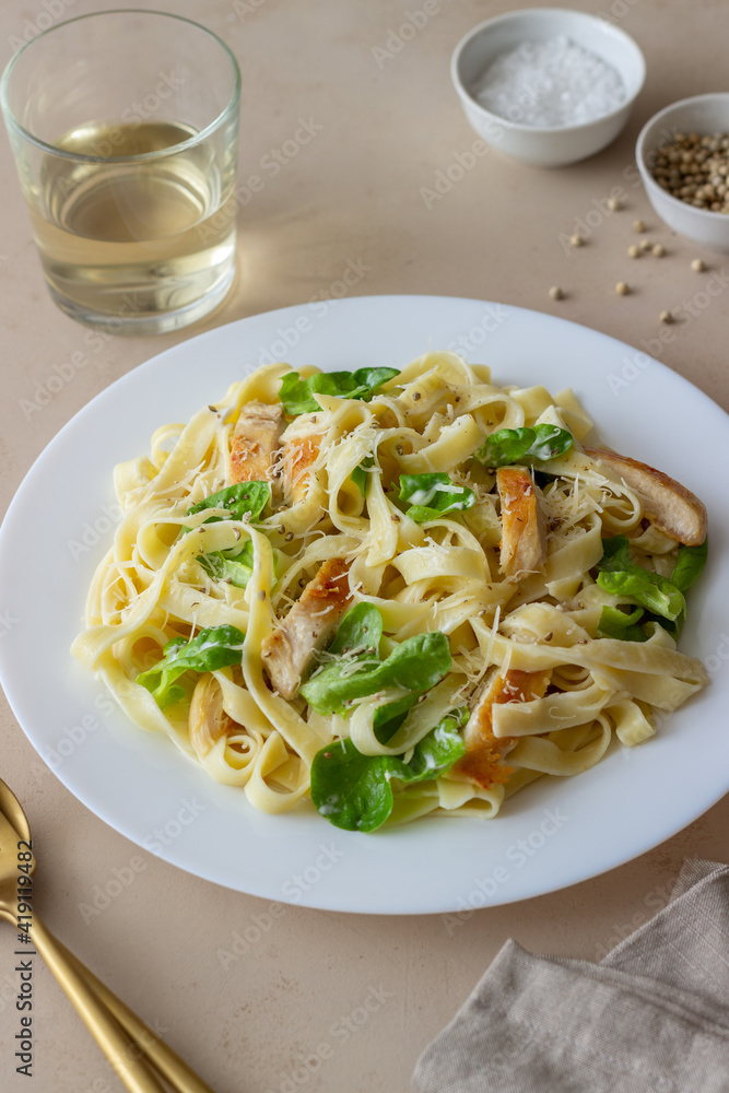 Italian fetuccini alfredo pasta with chicken. National cuisine. Healthy eating. Italian fetuccini alfredo pasta with chicken. National cuisine. Healthy eating.