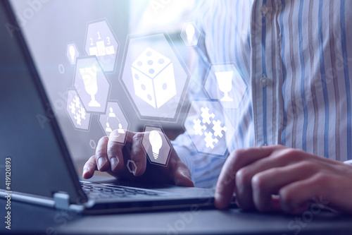 gamification, gaming technology in business and learning concept, blue toned