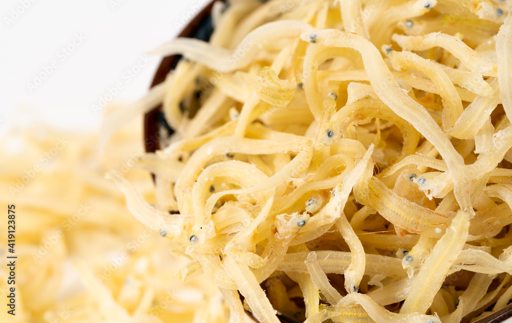 Dried spaghetti fish on pure white background Dried spaghetti fish on pure white background
