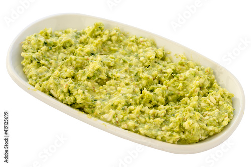 Cheese and pistachio paste appetizer (mezze) isolated on a white background. Healthy vegan food. Local name grit ezmesi