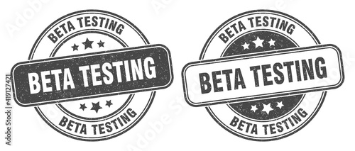 beta testing stamp. beta testing label. round grunge sign