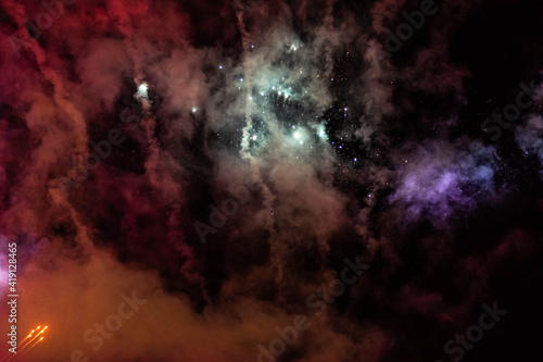 Abstract background of burning fireworks, smoke and fireworks. Space Concept, Nebula and Stars