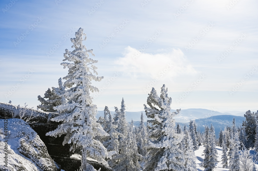 the rock is covered with snow in winter