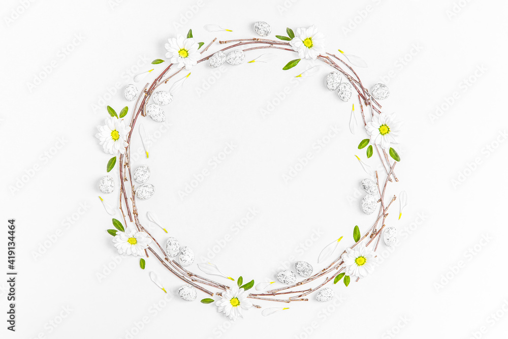 Fototapeta premium Creative layout composition of flowers and easter eggs on pastel background.