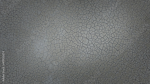 The ground has cracks in the top view for the background or graphic design with the concept of drought and death, grey photo