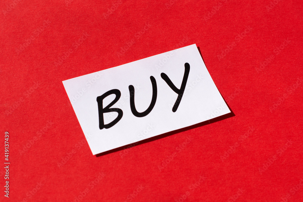 word buy on a red background. Shopping concept word buy on a red background. Shopping concept