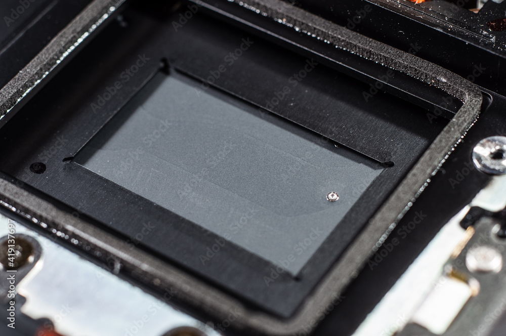 Close-up shutter covering the camera sensor, macro photography Close-up shutter covering the camera sensor, macro photography