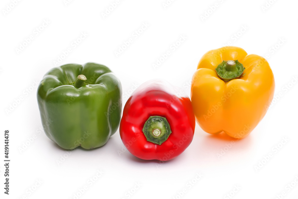 Three bell peppers, red, green and yellow on white background, Three bell peppers, red, green and yellow on white background,