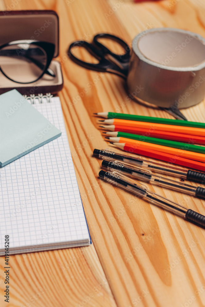multicolored pencils stationery paper office wooden table multicolored pencils stationery paper office wooden table