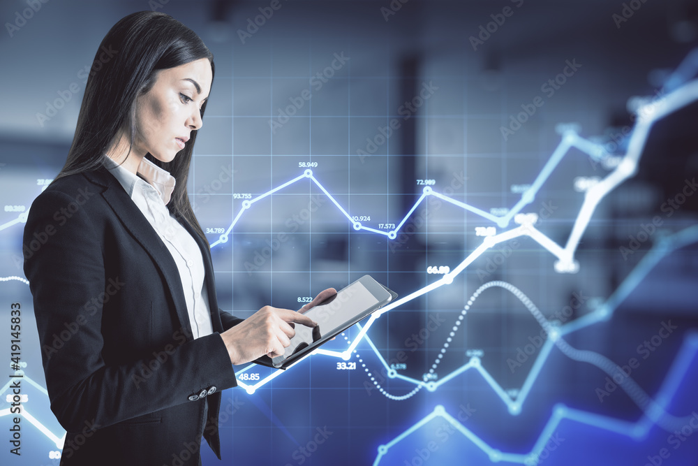 Big data analyzing and analytics concept with businesswoman and digital tablet on abstract background with glowing blue growing graphs Big data analyzing and analytics concept with businesswoman and digital tablet on abstract background with glowing blue growing graphs
