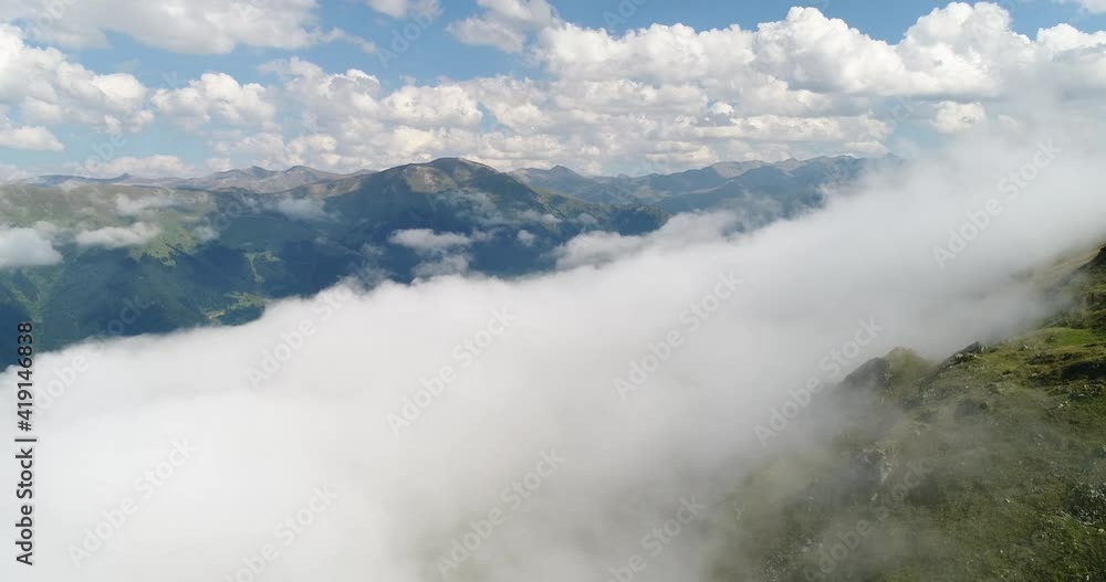 Aerial view of a village in the lush green rain cloud cover tropical rain forest mountain during the rainy season in the Trabzon - Turkey Aerial view of a village in the lush green rain cloud cover tropical rain forest mountain during the rainy season in the Trabzon - Turkey
