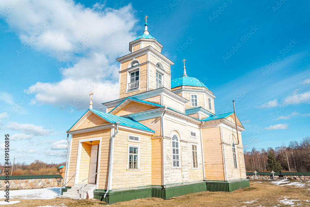 Golisheva St. Trinity Orthodox Church in Latvia. architectural style – the shape of a cross. A church has a humble exterior, but the interior is rich and luxurious.