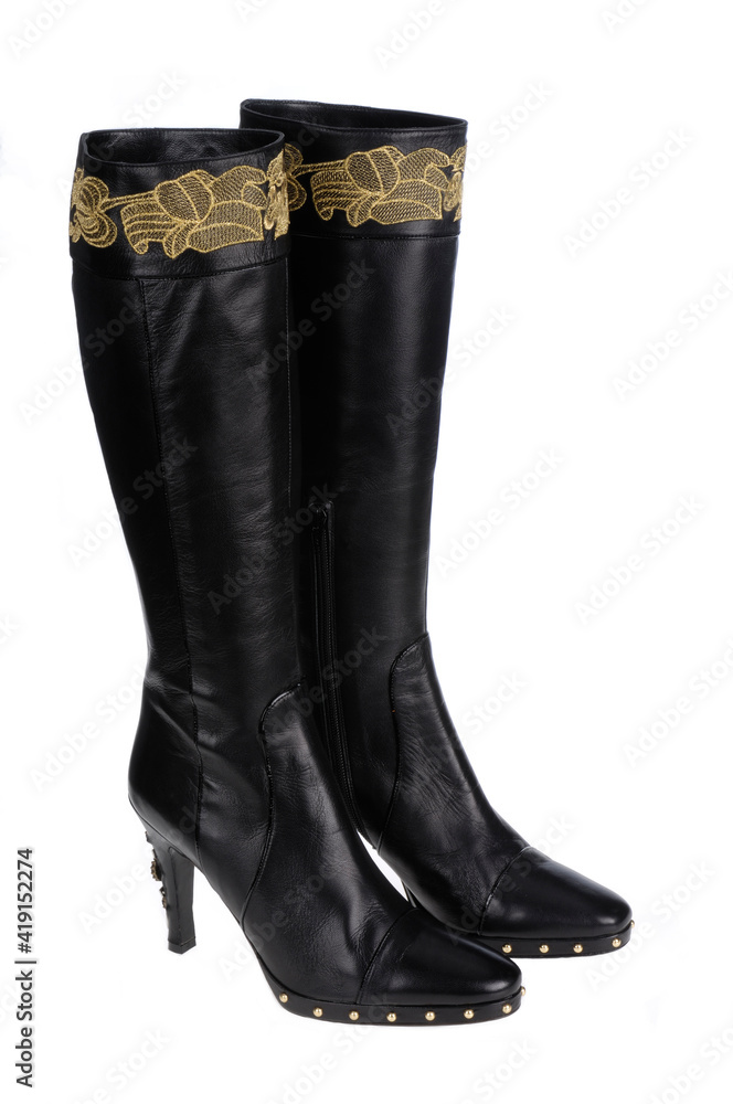 Fashionable women boots for all seasons. Studio shoot Fashionable women boots for all seasons. Studio shoot