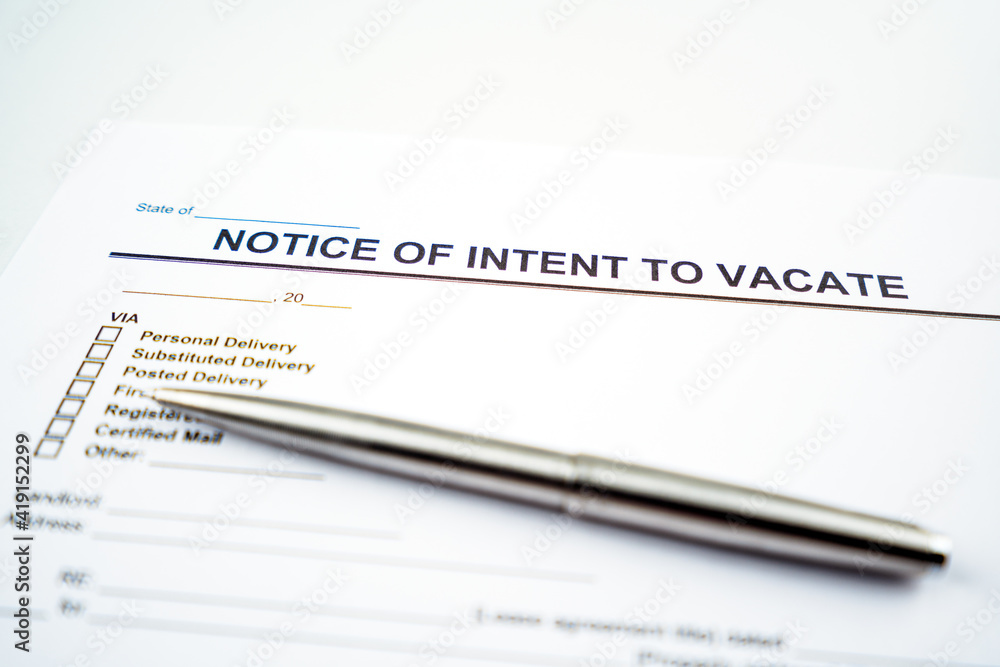 Notice of intent to vacate letter and pen. Notice of intent to vacate letter and pen.