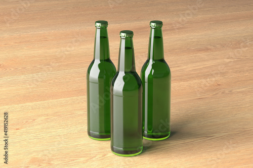 Three beer bottles 500ml mock up on wooden background.