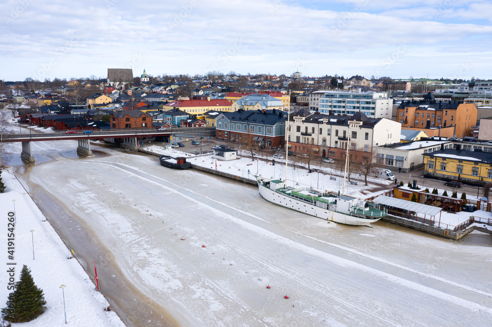 Finland .Porvoo. March 3, 2021. View of the Porvoonjoki river and the city center in winter. Sunny day. Photo from the drone..A high resolution.