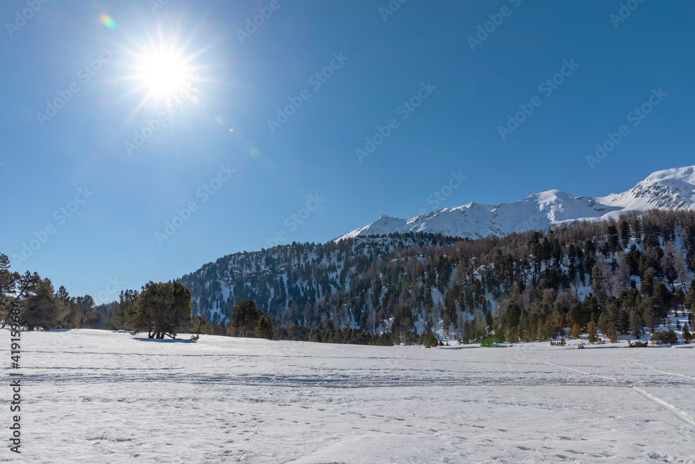 Landscape with lots of snow on Lukmanier in Ticino, on the Swiss alps