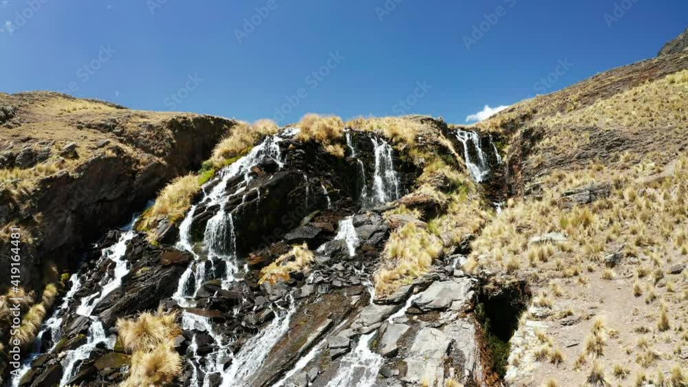 Aerial view of Condoriri Peak and waterfall in Cordillera Real, Andes, Bolivia Aerial view of Condoriri Peak and waterfall in Cordillera Real, Andes, Bolivia