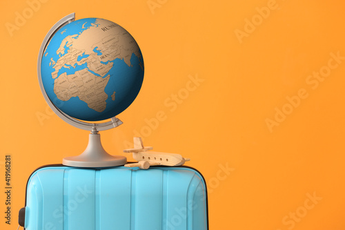 Globe and wooden airplane o...