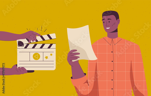 Backstage of filmmaking scene. Actor rehearses and reads script