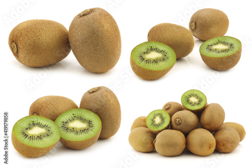 fresh kiwi fruit and some cut ones on a white background