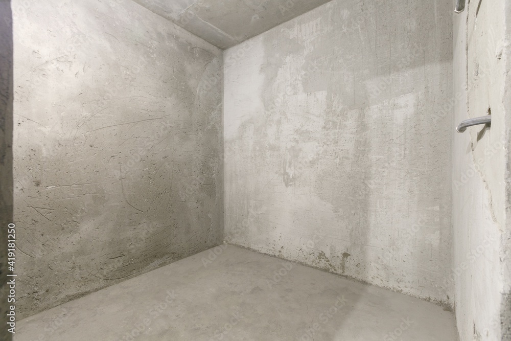 interior of the apartment without decoration in gray colors. rough finish interior of the apartment without decoration in gray colors. rough finish