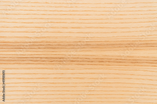 top view of light brown, textured wooden laminate flooring