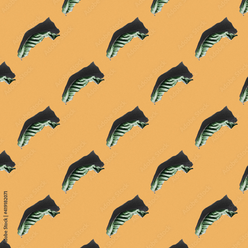 Fototapeta premium Patterns on an orange background. Dry leaf .