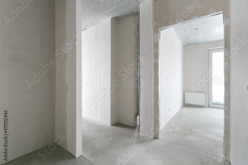 interior of the apartment without decoration in gray colors. rough finish