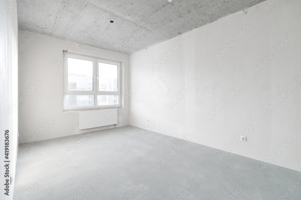 interior of the apartment without decoration in gray colors. rough finish interior of the apartment without decoration in gray colors. rough finish