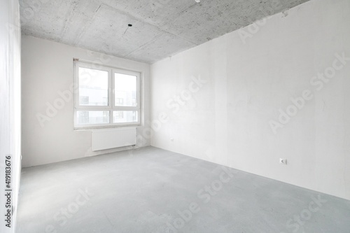 interior of the apartment without decoration in gray colors. rough finish